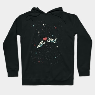 Astronaut Floating in Space by Tobe Fonseca Hoodie